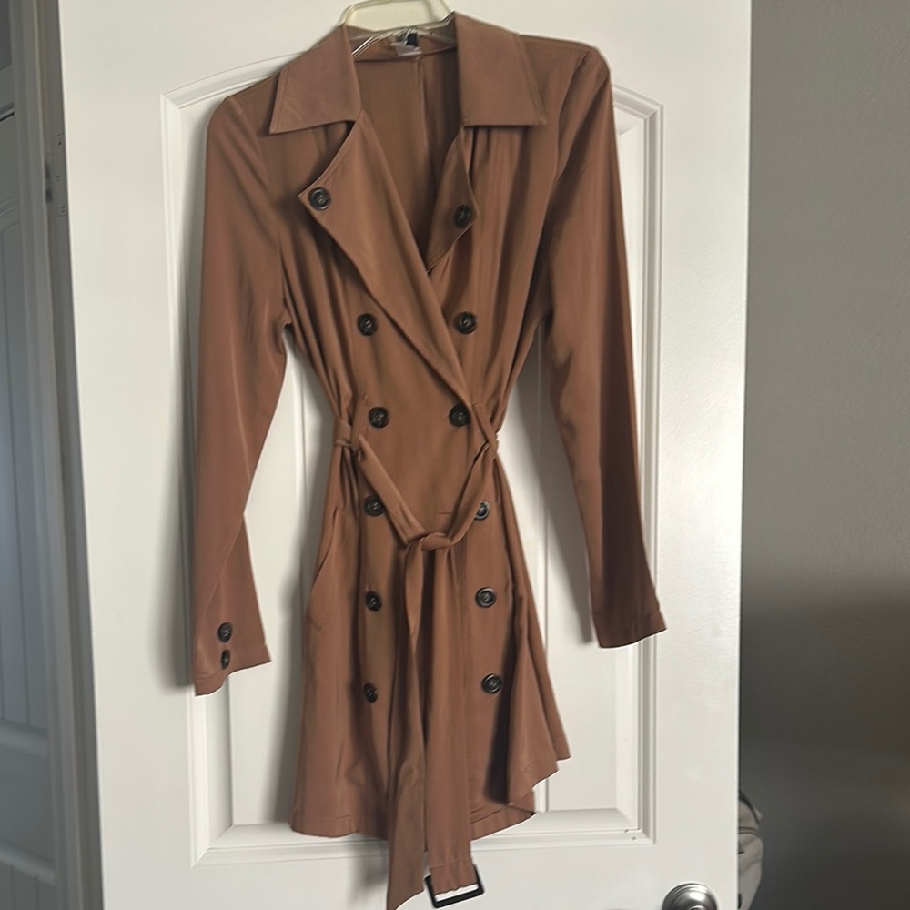 Stylish Tan Trench Coat with Black Buttons